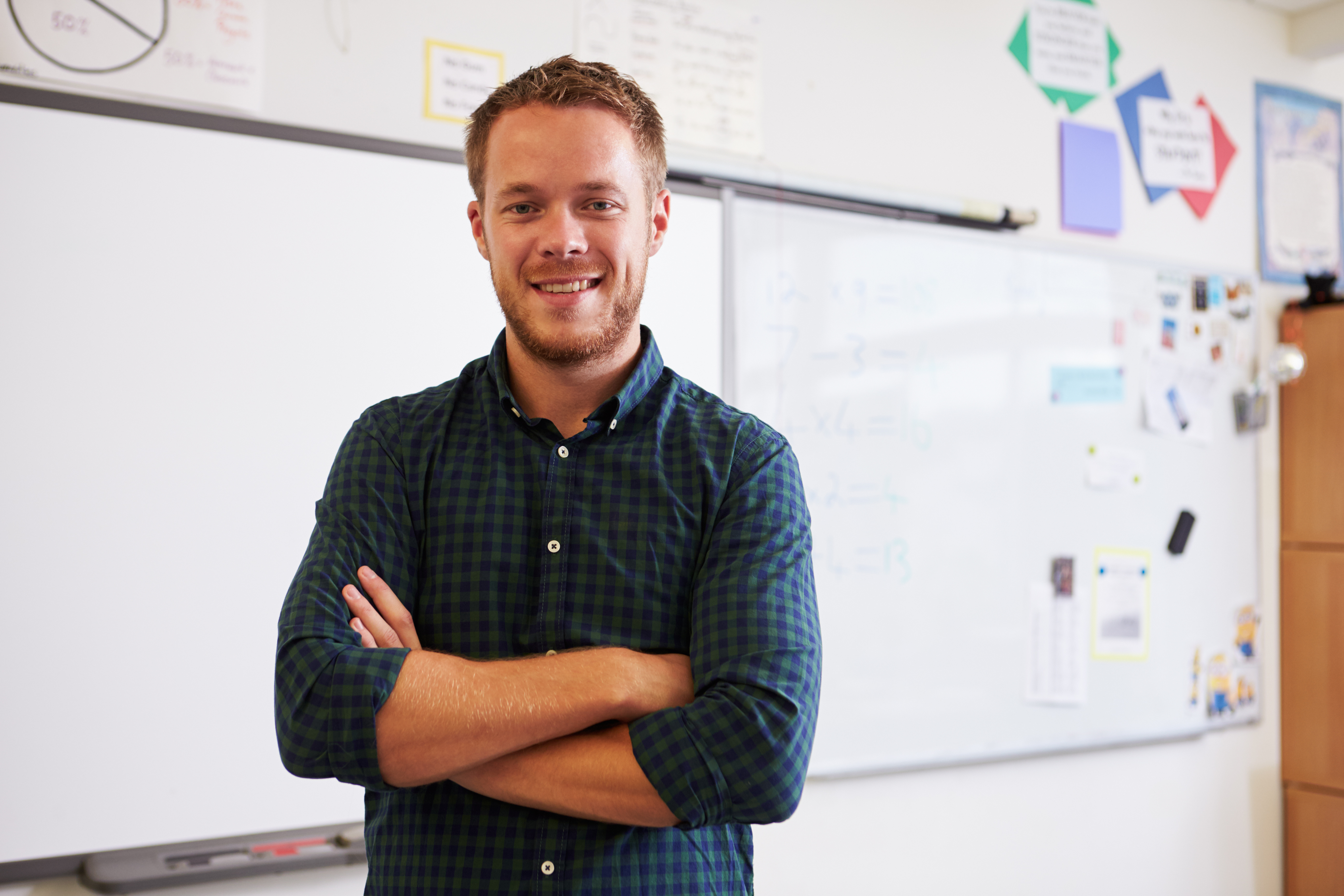 male teacher in classroom